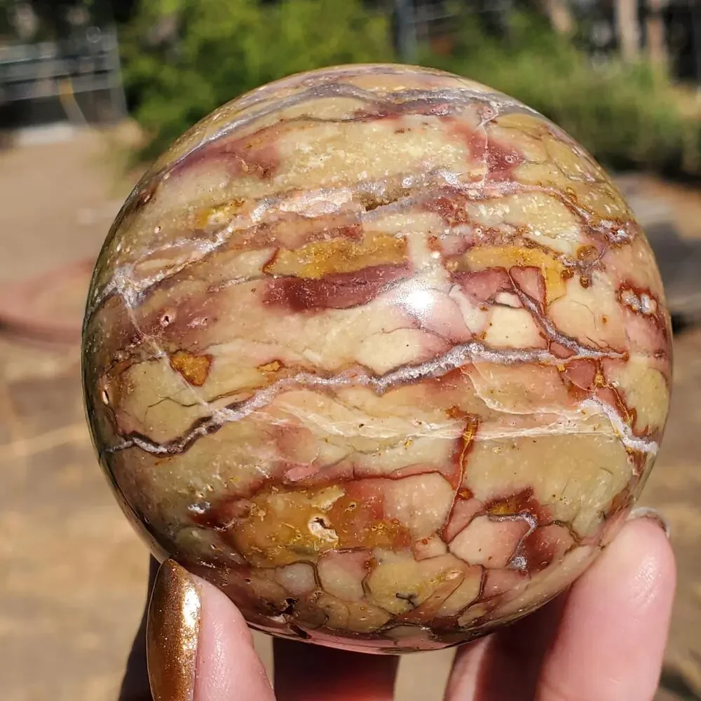 Pink Ocean Ibis Jasper Brecciated Sphere w/ Caves Druzy 458 grams 71mm